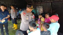 Sentuhan Kepedulian: Polres Humbahas Berikan Trauma Healing bagi Anak Korban Bencana