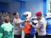 Polri Perkuat Kemitraan dengan Ojek Online: Polda Lampung Gelar Bakti Sosial dan kesehatan pada Apel Ojol Kamtibmas Nasional 2025