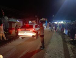 Pastikan Acara Barodak Warga Berjalan Aman dan Lancar, Bhabinkamtibmas Kelurahan Bugis Lakukan Pengamanan dan Pengaturan Lalu Lintas