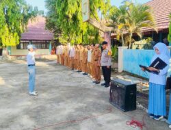 Wakili Kapolsek Madapangga Kanit Binmas Jadi Irup Bendera di SMA Negeri I Madapangga dan ini Penyampaiannya